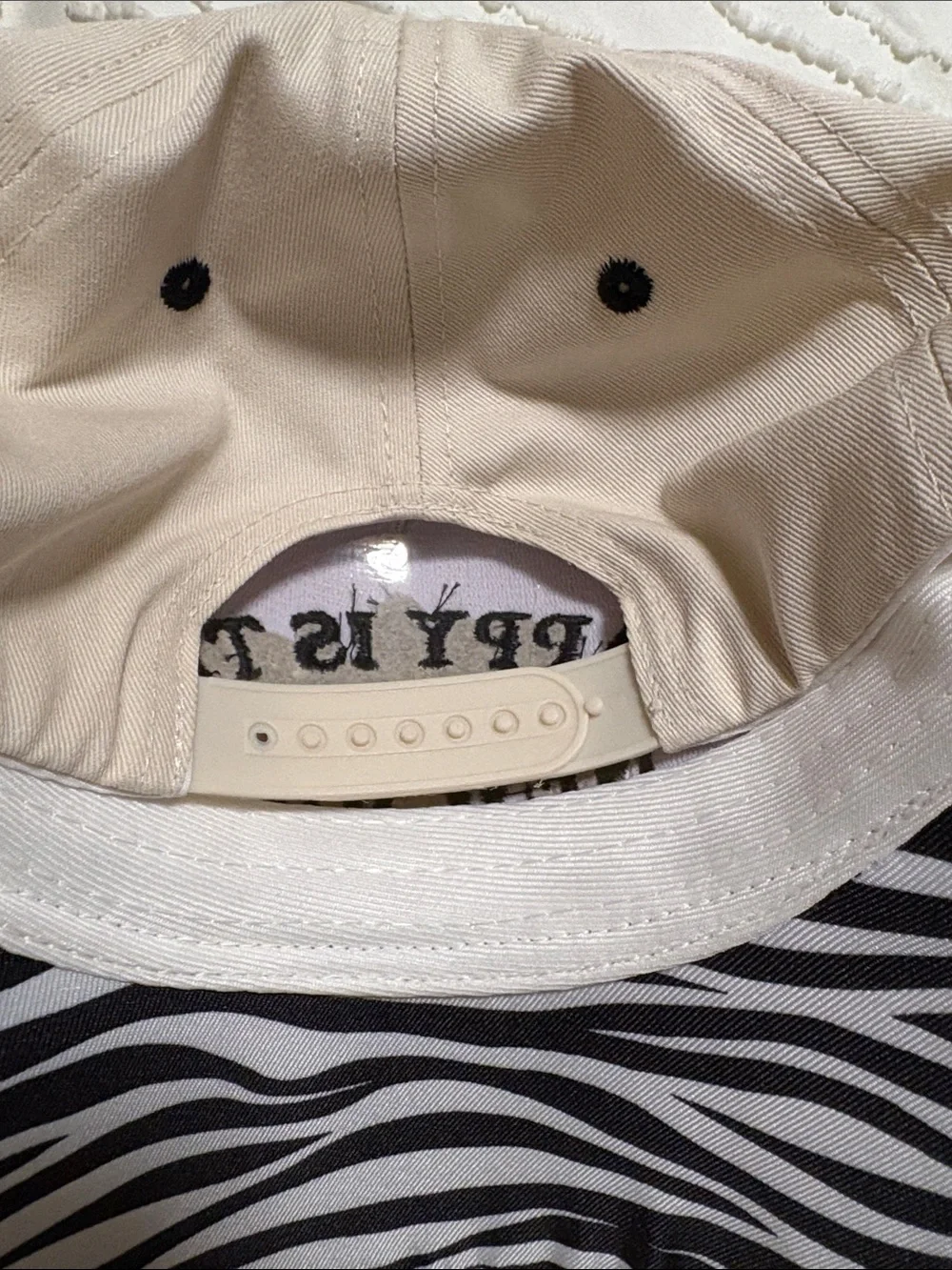 Beige and Black Zebra Print Cap - Happy Is The New Rich NWOT